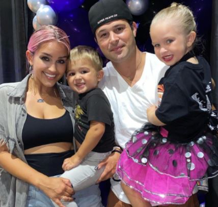 Stephanie Nicole Clark with her husband Cody Longo and kids